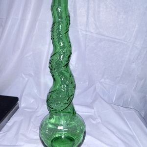 Vintage decorative green glass bottle